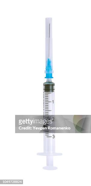 syringe isolated on white background - needle fotografías e imágenes de stock