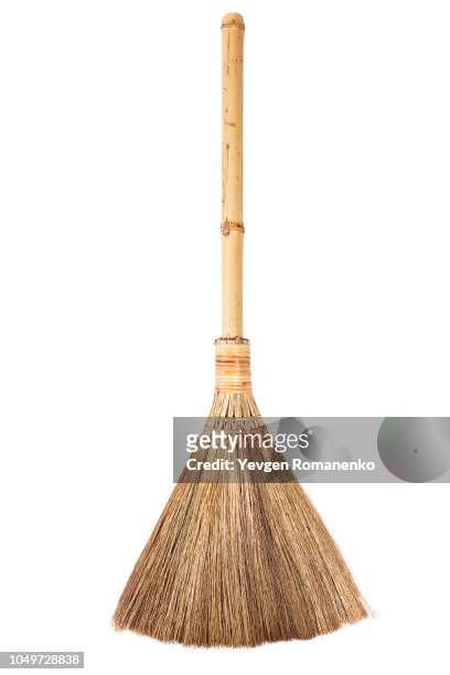 straw broomstick isolated on white background - broom stock pictures, royalty-free photos & images