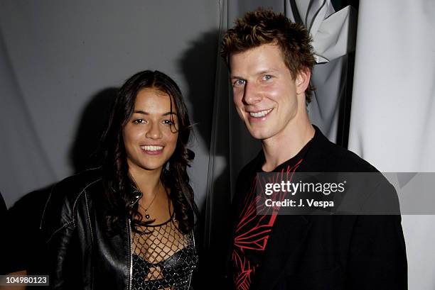 Michelle Rodriguez and Eric Mabius during "Resident Evil" Premiere After Party at the GQ Lounge at GQ Lounge in Los Angeles, California, United...