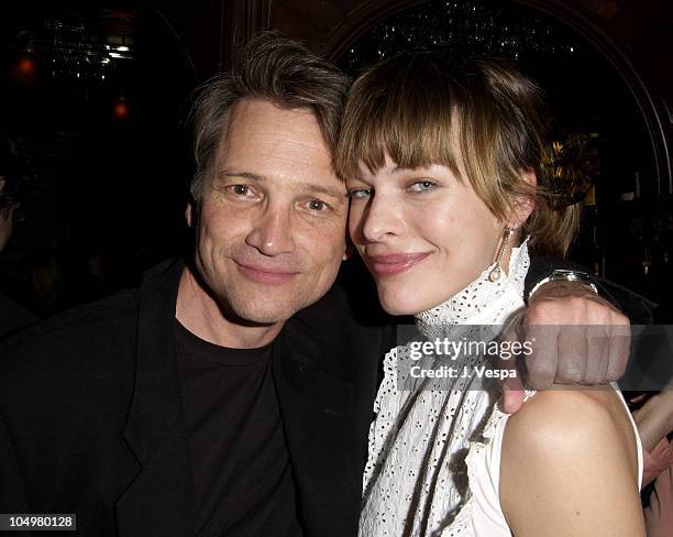 Clint Culpepper & Milla Jovovich during "Resident Evil" Premiere After Party at the GQ Lounge at GQ Lounge in Los Angeles, California, United States.