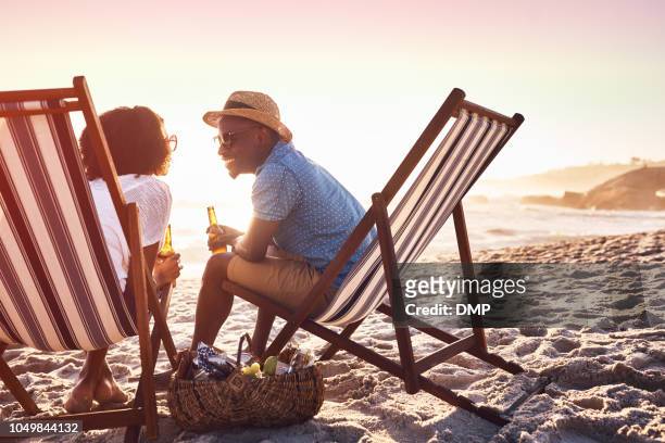 it wouldn't be summer without a bit of romance - beach holiday stock pictures, royalty-free photos & images