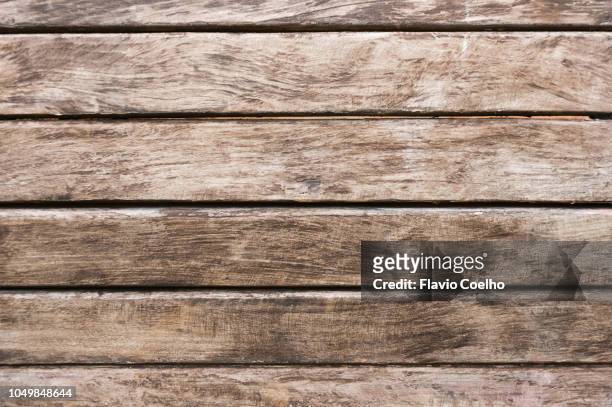 old wooden bench seat close-up - table only close up stock-fotos und bilder