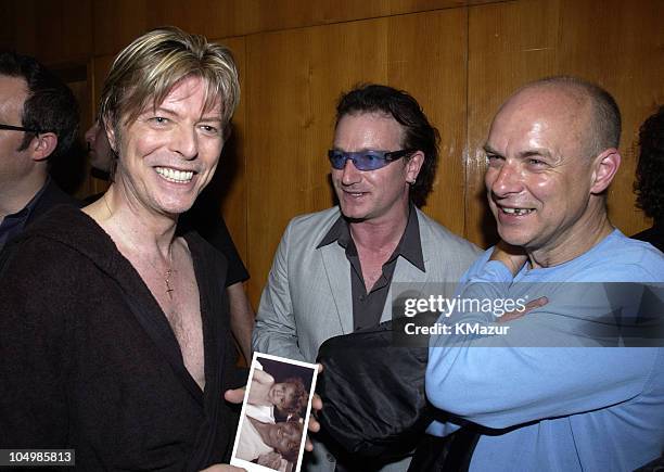 David Bowie, Bono and Brian Eno during David Bowie performs at the Meltdown Festival that was curated by David Bowie at Royal Festial Hall in London,...