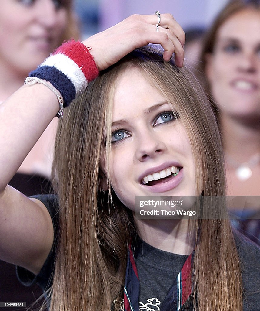 Avril Lavigne Visits MTV's "TRL" - August 22, 2002