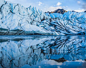Matanuska Icefall reflected in calm supraglacial lake