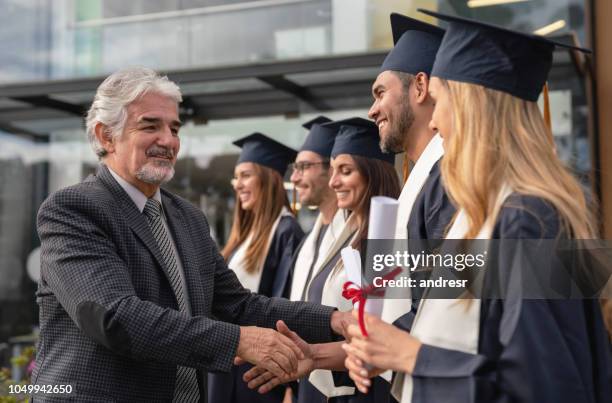 Graduation Hand 883 Graduation Hand Shake Stock Photos, High-Res Pictures, and Images ...