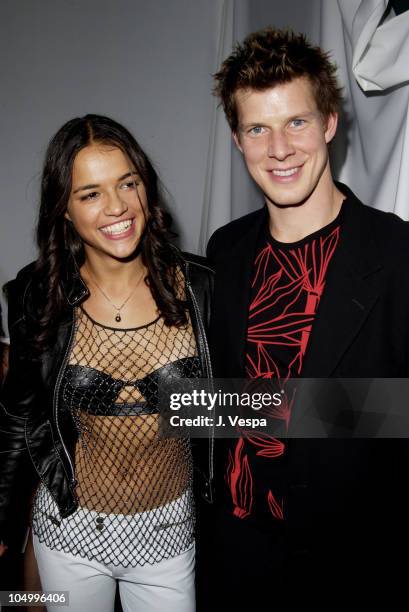 Michelle Rodriguez and Eric Mabius during "Resident Evil" Premiere After Party at the GQ Lounge at GQ Lounge in Los Angeles, California, United...