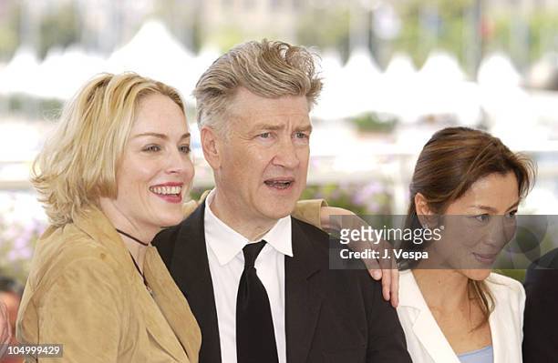 Sharon Stone, David Lynch and Michelle Yeoh during Cannes 2002 - "Official Jury" Photo Call at Palais Des Festivals in Cannes, France.