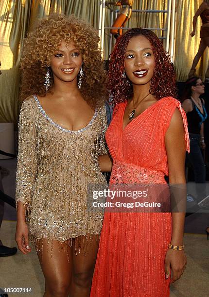 Beyonce Knowles & sister Solange during "Austin Powers In Goldmember" Premiere at Universal Amphitheatre in Universal City, California, United States.