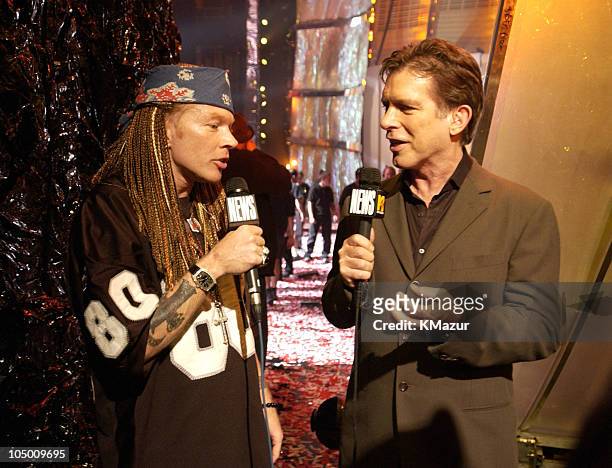 Axl Rose and Kurt Loder during 2002 MTV Video Music Awards - Backstage and Audience at Radio City Music Hall in New York City, New York, United...