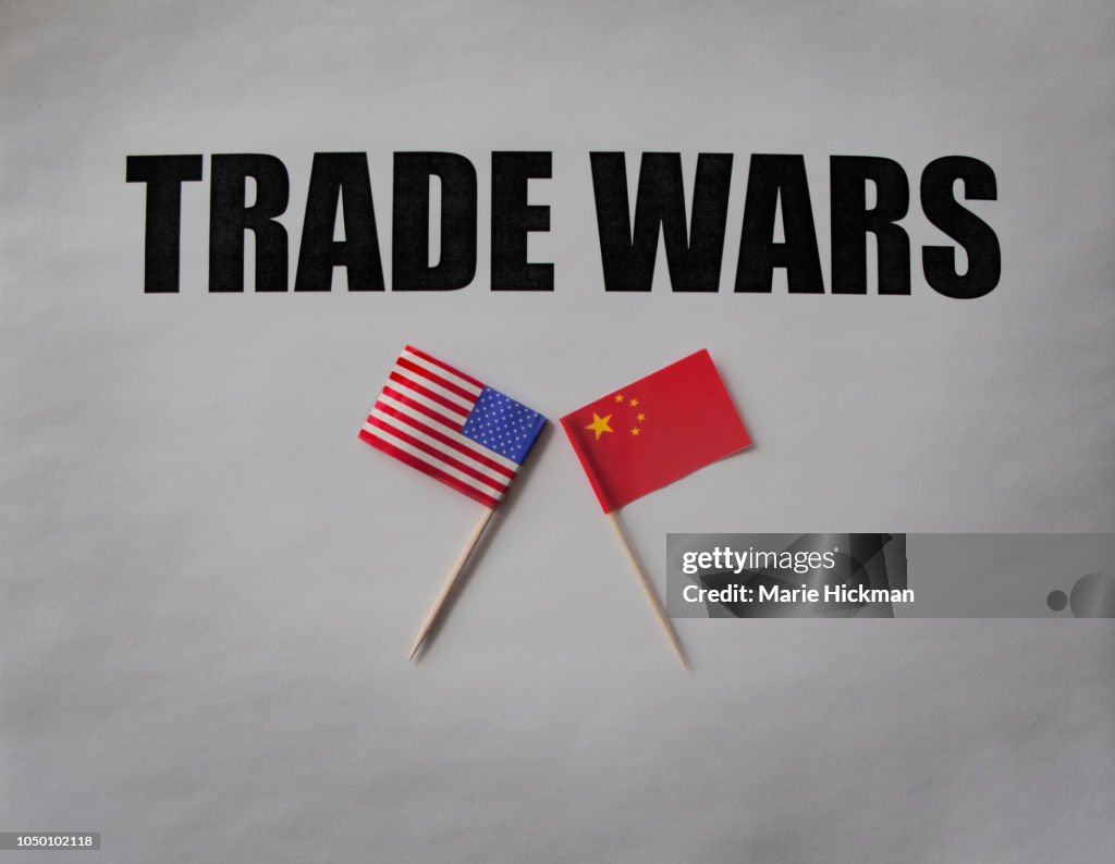 Trade Wars with U.S FLAG and CHINESE FLAG.