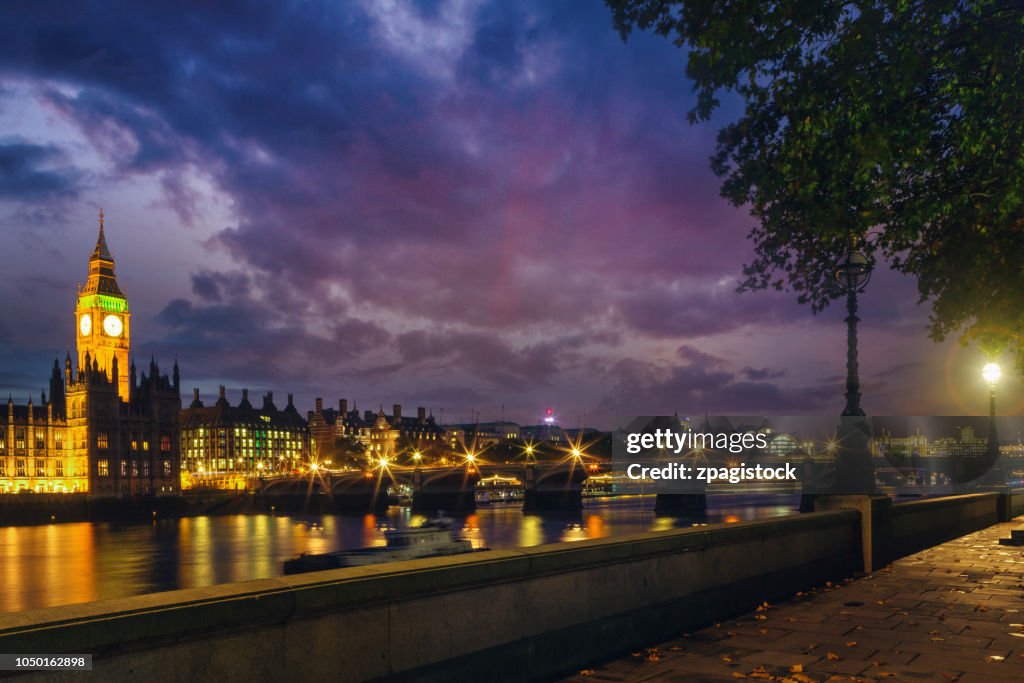 Big Ben and the Westminster Bridge in London at dusk