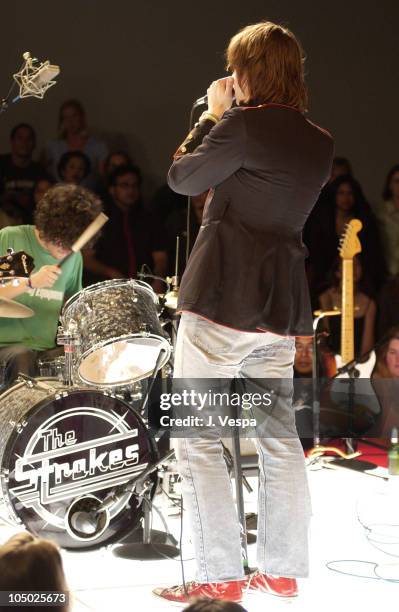 Singer Julian Casablancas & drummer Fabrizio Moretti of The Strokes perform