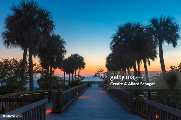 boardwalk in fort myers beach florida - fort myers stock-fotos und bilder