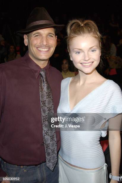 Phillip Bloch and Izabella Miko during Mercedes Benz Fashion Week Fall 2003 Collections - Luca Luca - Front Row at Bryant Park in New York City, New...