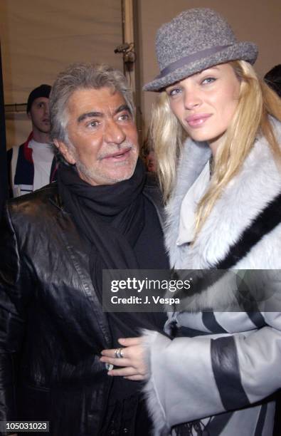 Roberto Cavalli and Esther Canadas during Mercedes Benz Fashion Week Fall 2003 Collections - Luca Luca - Front Row at Bryant Park in New York City,...