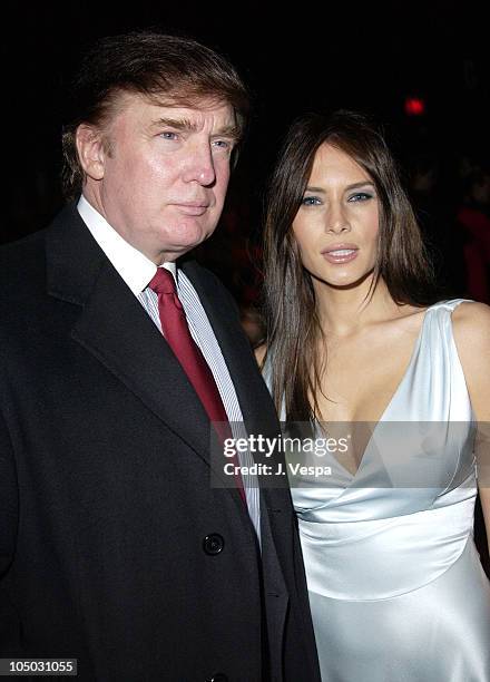 Donald Trump and Melania Knauss during Mercedes Benz Fashion Week Fall 2003 Collections - Luca Luca - Front Row at Bryant Park in New York City, New...