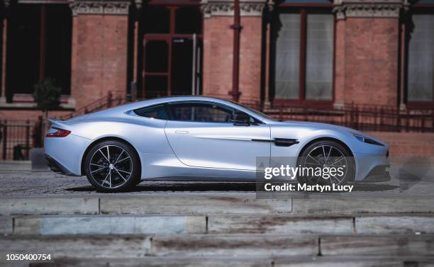 The Aston Martin Vanquish, seen outside the St Pancras Renaissance Hotel in London, England. This is the second generation model, with many styling...