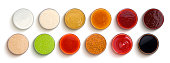 Different sauces isolated on white background, top view