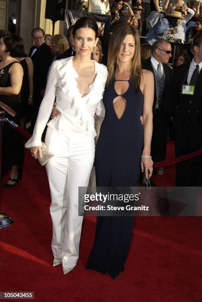 Courteney Cox Arquette and Jennifer Aniston during 9th Annual Screen Actors Guild Awards - Arrivals at Shrine Exposition Center in Los Angeles,...