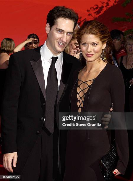 Debra Messing and husband Daniel Zelman during The 54th Annual Primetime Emmy Awards - Arrivals at The Shrine Auditorium in Los Angeles, California,...