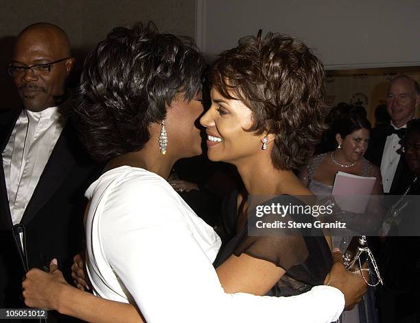 Oprah Winfrey and Halle Berry during The 15th Carousel Of Hope Ball - VIP Reception at Beverly Hilton Hotel in Beverly Hills, California, United...