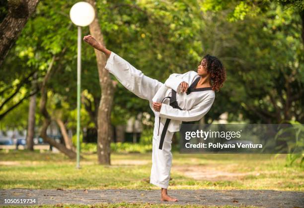 fighter  - women's judo stock-fotos und bilder