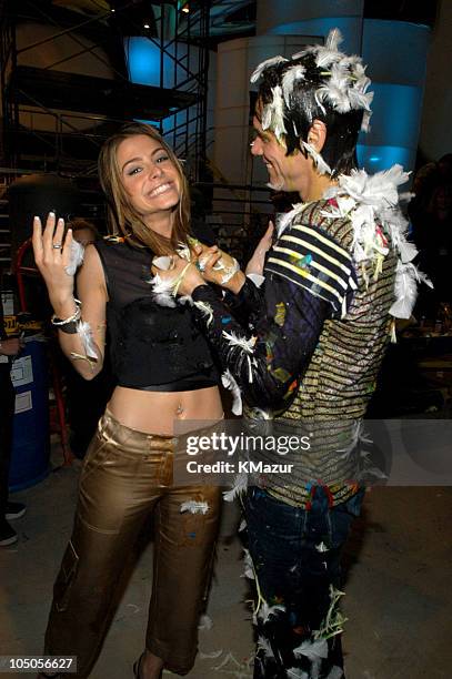 Maria Menounos and Jim Carrey during Nickelodeon Kids Choice Awards 2003 - Backstage at Barker Hangar in Santa Monica, California, United States.