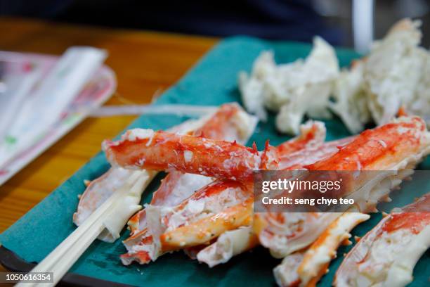 traditional japanese cuisine, king crab legs on plate - alaskan king crab foto e immagini stock