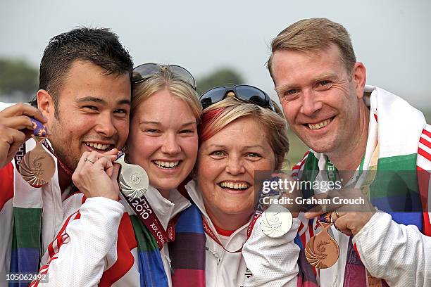 From left Aaron Heading Cynthie Meyer, Sue Nattrass and Dave Kirk of England who won bronze and silver in the Mens and Womens Pairs Trap Shooting...