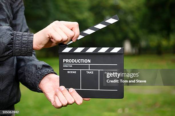 clapper-board, lights, camera, action! - カチンコ ストックフォトと画像