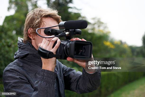 cameraman filming - vcr stock pictures, royalty-free photos & images