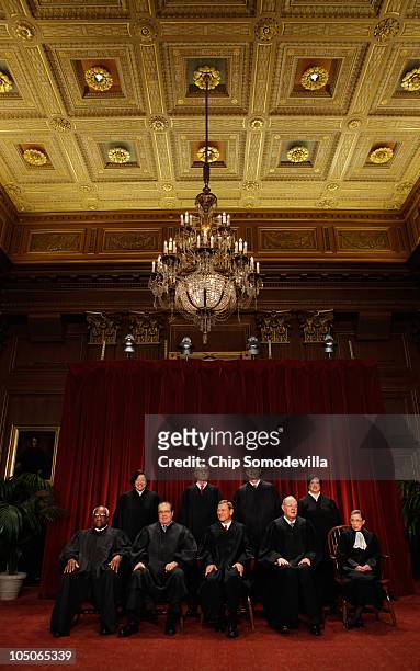 Supreme Court members Associate Justice Clarence Thomas, Associate Justice Antonin Scalia, Chief Justice John Roberts, Associate Justice Anthony...