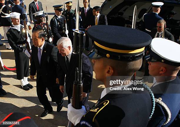 Secretary of Defense Robert Gates participates in an honor cordon to welcome South Korean Minister of National Defense Kim Tae-young October 8, 2010...