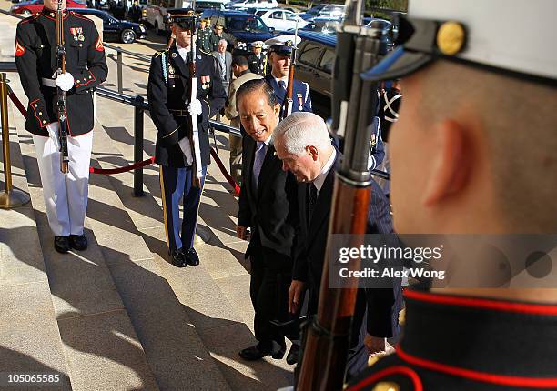 Secretary of Defense Robert Gates participates in an honor cordon to welcome South Korean Minister of National Defense Kim Tae-young October 8, 2010...