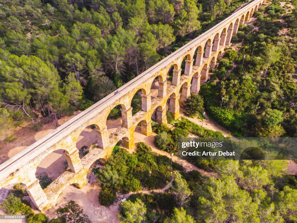 Aerial picture taken with drone of the beautiful Tarragona Roman bridge.