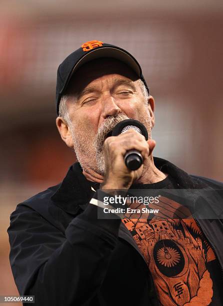 Actor Robin Williams cheers before the Giants before the Atlanta Braves game against the San Francisco Giants in game 1 of the NLDS at AT&T Park on...