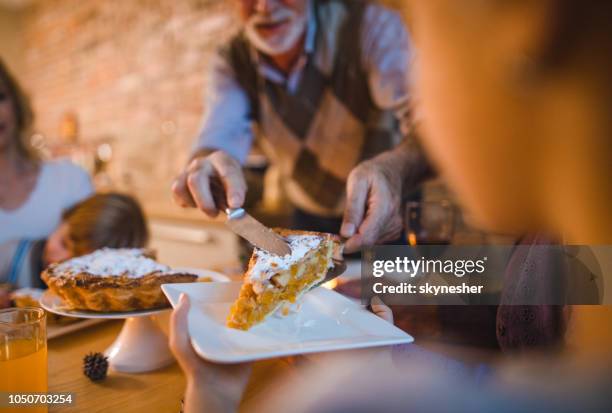 a piece of apple pie for you! - man eating pie stock pictures, royalty-free photos & images