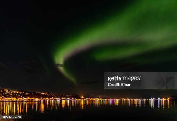 northern lights in eyjafjordur iceland - akureyri iceland stock-fotos und bilder