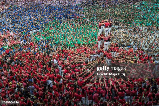 Castellers de Barcelona build a human tower during the 27th Tarragona Competition on October 07, 2018 in Tarragona, Spain. The 'Castellers' who build...