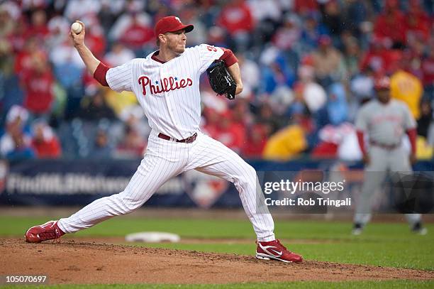 Roy Halladay of the Philadelphia Phillies delivers a pitch against the Cincinnati Reds in a game that he throws a no hitter on October 6, 2010 during...