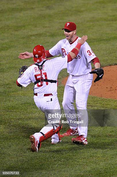 Roy Halladay of the Philadelphia Phillies celebrates with Carlos Ruiz after throwing a no hitter against the Cincinnati Reds on October 6, 2010...