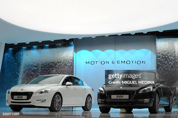 The new Peugeot 508 model from French carmanufacturer PSA is displayed at the Paris Auto Show on the first of the two press-days on September 30,...