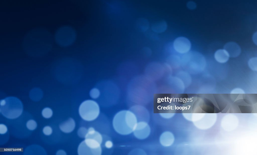 Defocused Lights Background with Lens Flare
