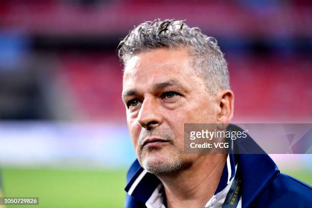 Italian former footballer Roberto Baggio reacts during a football all-star friendly match at the Shanxi Sports Centre Stadium on October 6, 2018 in...