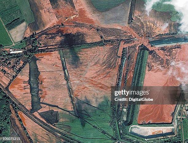 This satellite image shows the toxic spill as it spreads over the landscape, on October 08, 2010 in Ajka, Hungary. A million cubic metres of toxic...