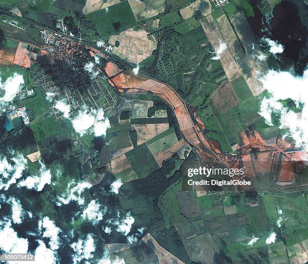 This satellite image shows the toxic spill as it spreads over the landscape, on October 08, 2010 in Ajka, Hungary. A million cubic metres of toxic...