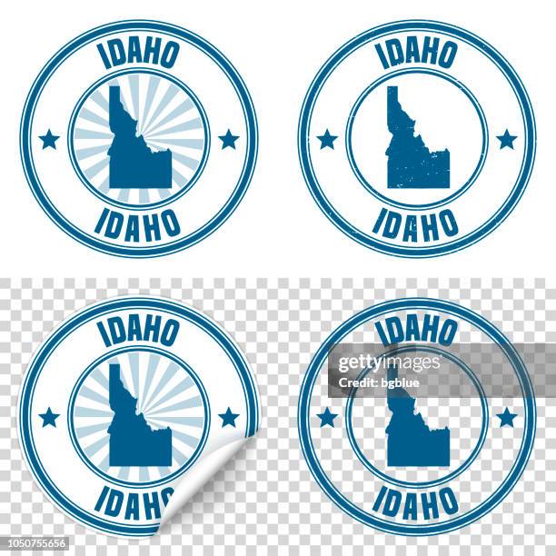 ilustraciones, imágenes clip art, dibujos animados e iconos de stock de idaho - etiqueta engomada azul y sello con nombre y mapa - idaho