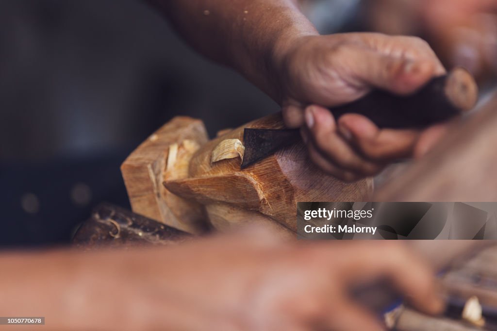 Close-up of wood being manufactured by hand. Hoi An, Quang Nam, Vietnam.