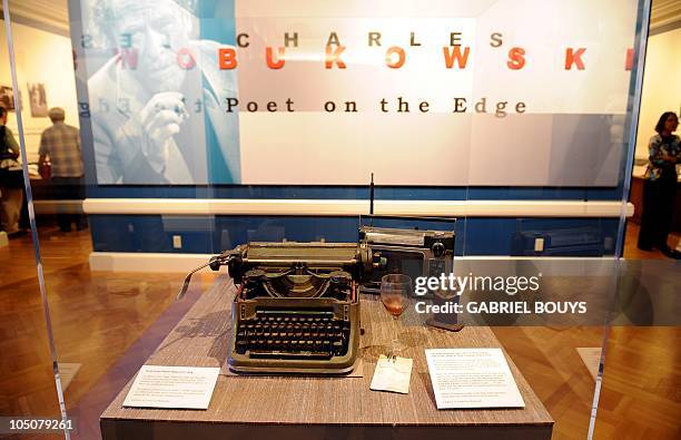 Items from Charles Bukowski's desk are on display during the media preview of the exhibition "Charles Bukowski, poet on the edge" at the Huntington...